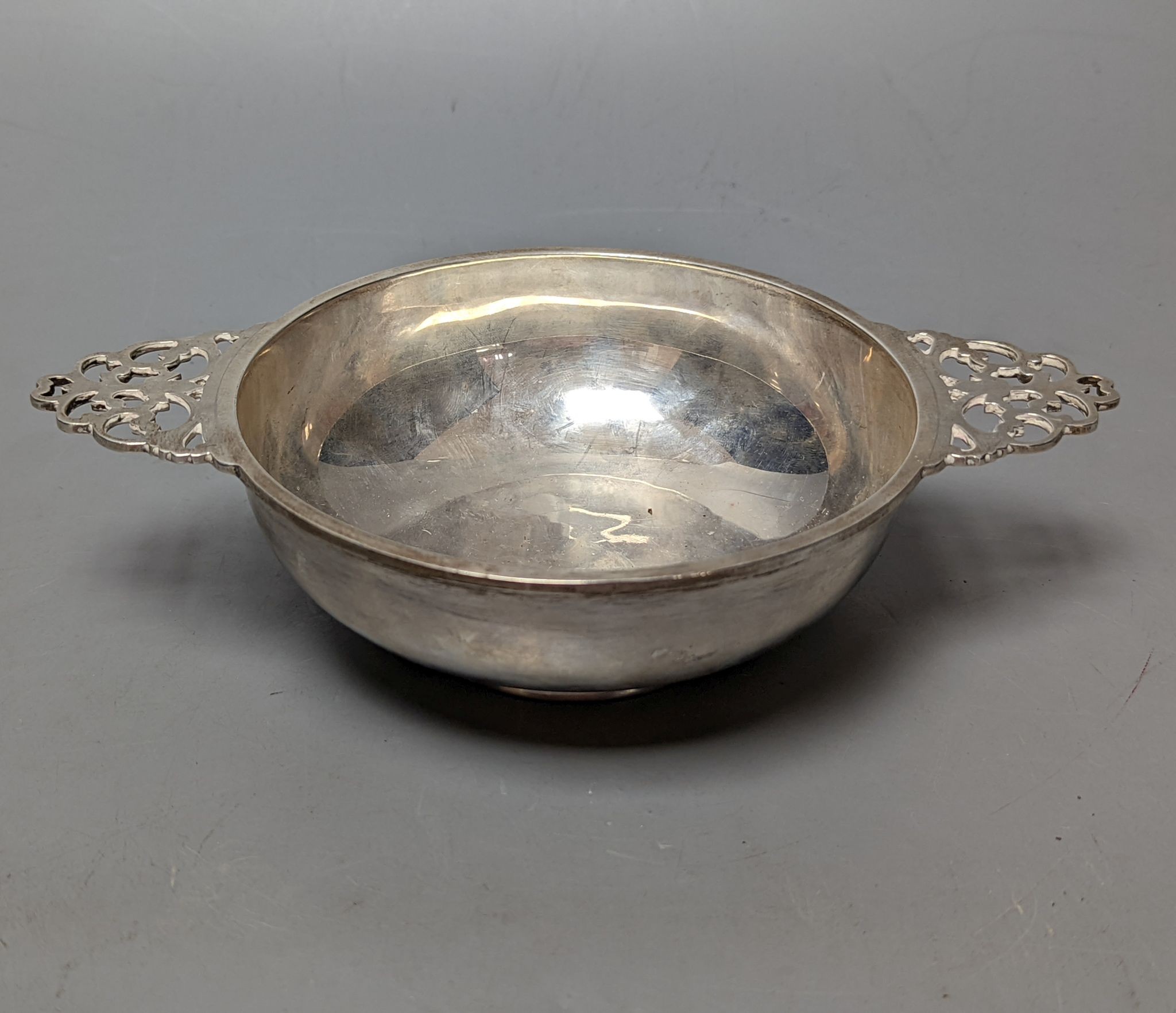 A George VI Scottish silver silver quaich, with pierced handles and engraved inscription, by H.D. Falconer & Son, Glasgow 1947, 20.2cmm over handles,7.5oz.